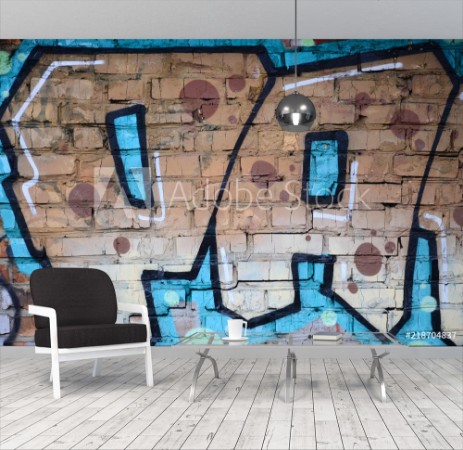 Image de Fragment of graffiti drawings The old wall decorated with paint stains in the style of street art culture Colored background texture